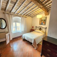 Room 1C in the centre on the ground floor next to the kitchen.  It has a queen-size bed.  The window looks out on to the terrace.  It has a private shower and WC. This room is ideal for anyone who has mobility problems as it is on the ground floor.